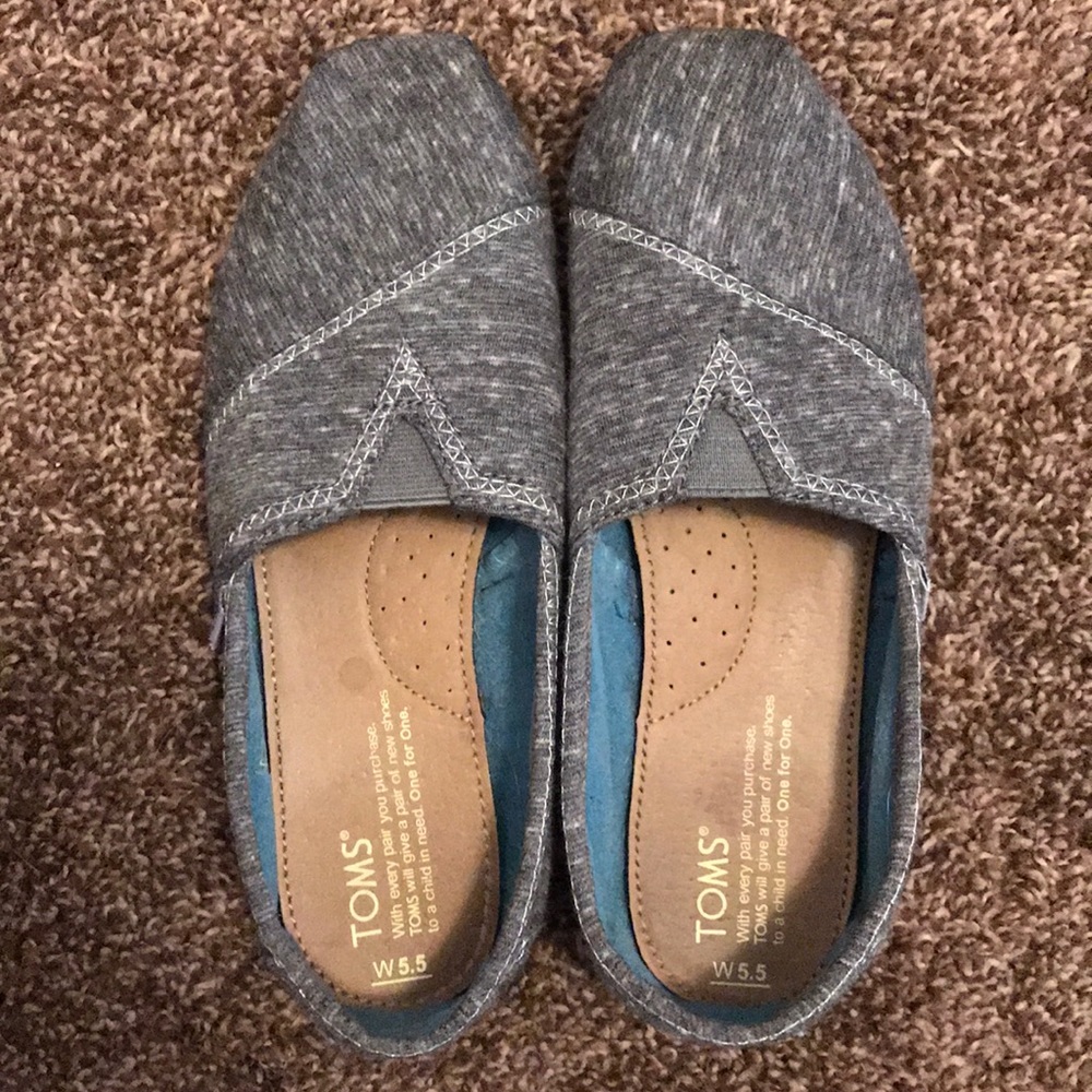 TOMS grey slip ons